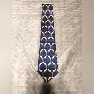 Thomas Pink brand men's necktie navy and gold design